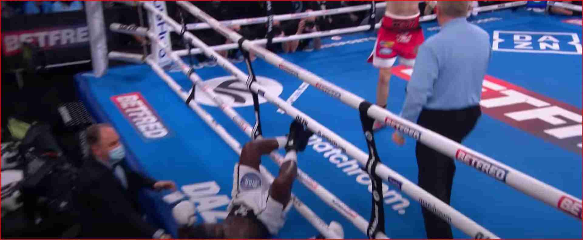 Boxer Knocked Out Of The Ring Through The Ropes
