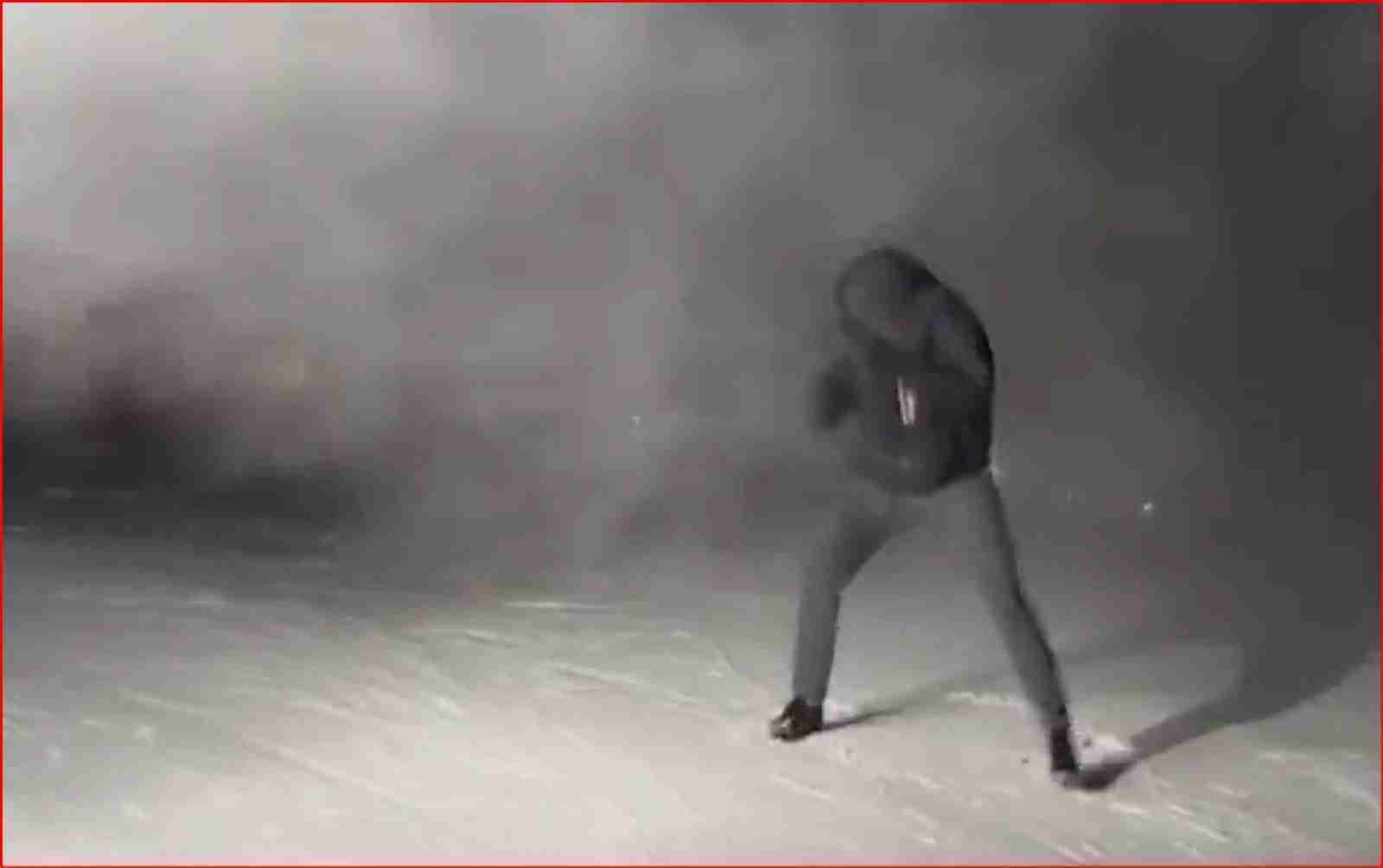Heavyweight champion pushes through man made snow storm