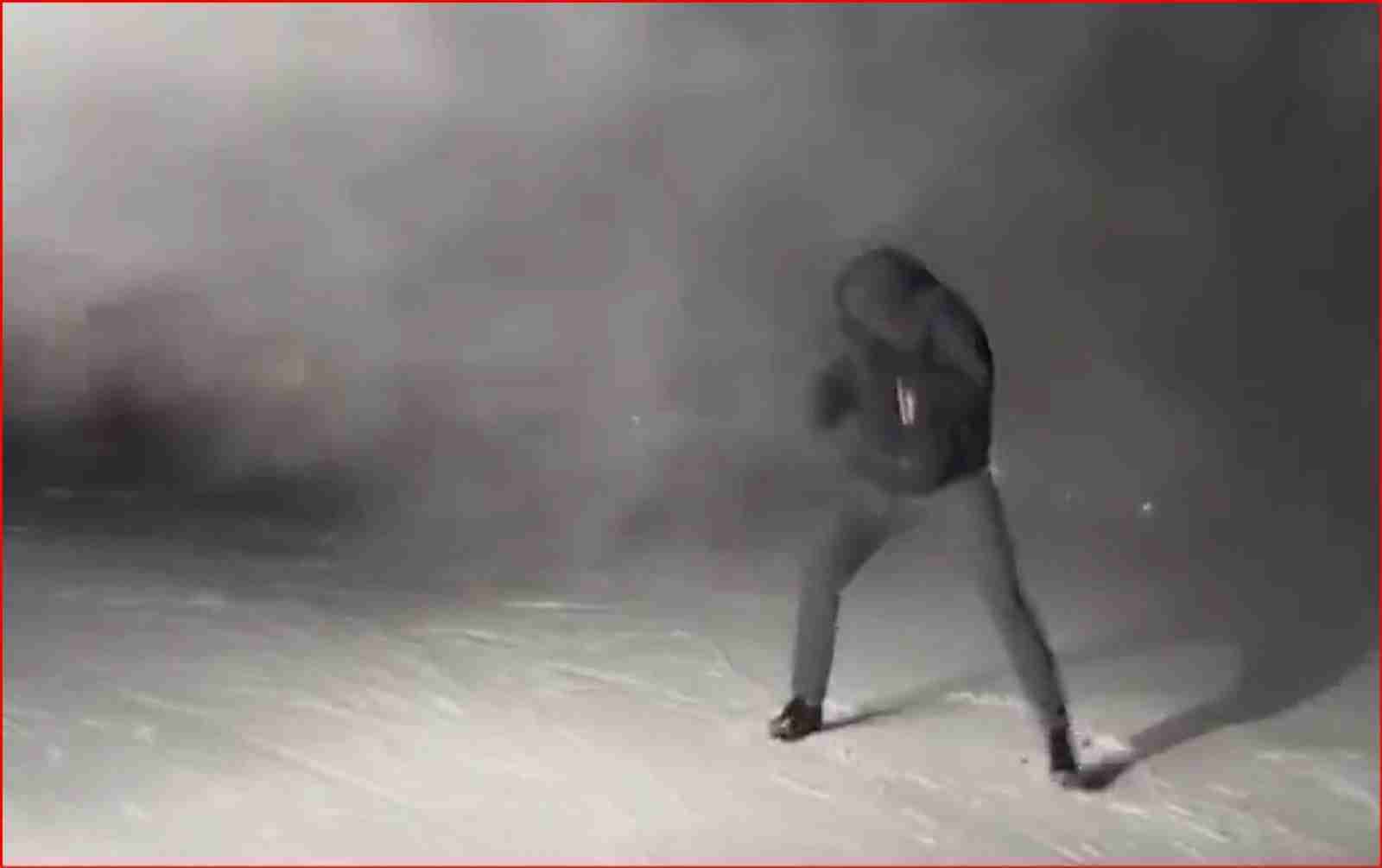 Watch: Heavyweight champion pushes through man made snow storm