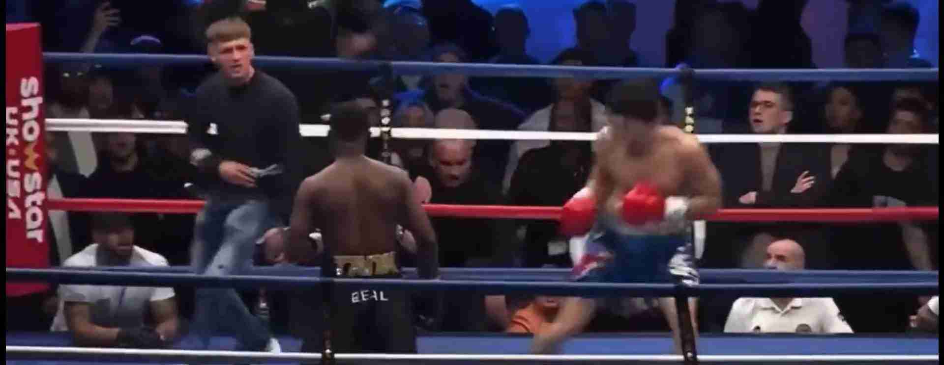 Watch: Fan enters a boxing ring disrupts fight and gets removed by staff
