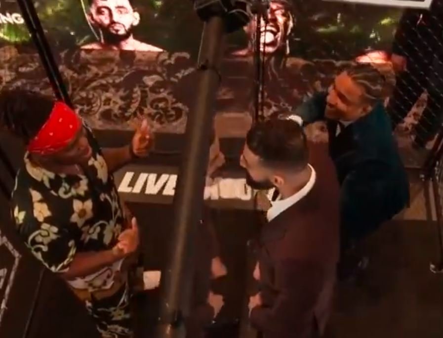 KSI Is Fighting 2 Boxers and Faced Off With Them In A Small Cage