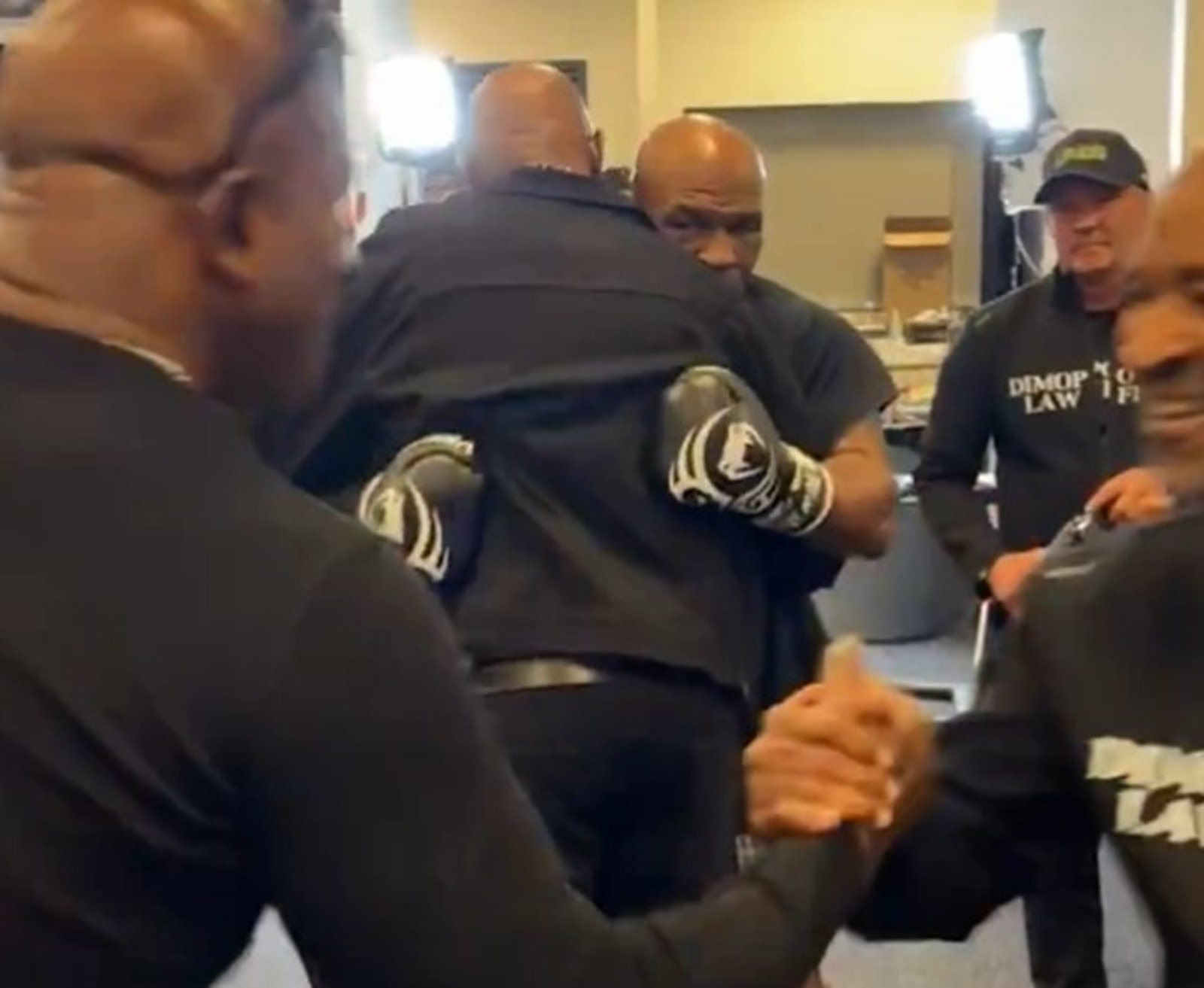 Lennox Lewis and Evander Holyfield Go To Mike Tyson Locked Room Minutes Before Jake Paul Fight