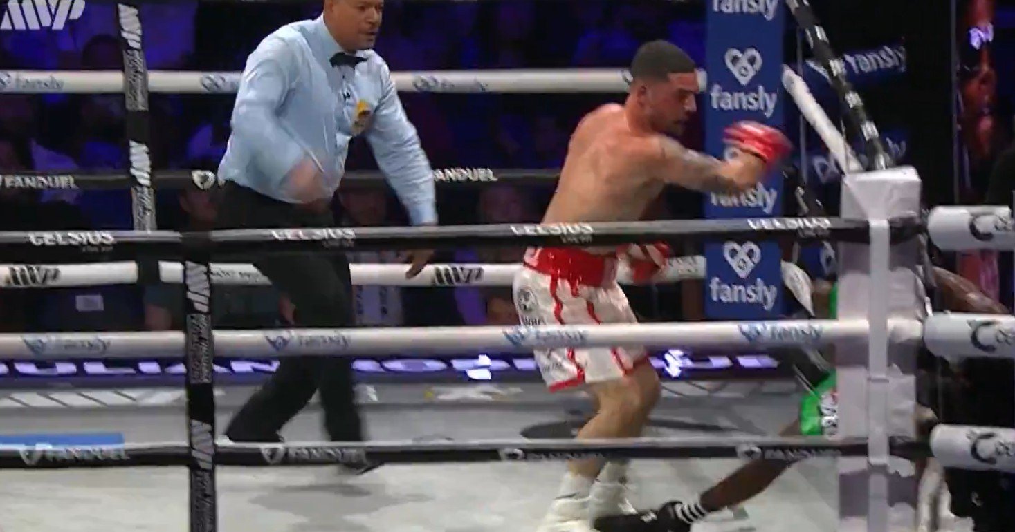Boxer Brutally Knocks Opponent Out Literally Through The Ropes