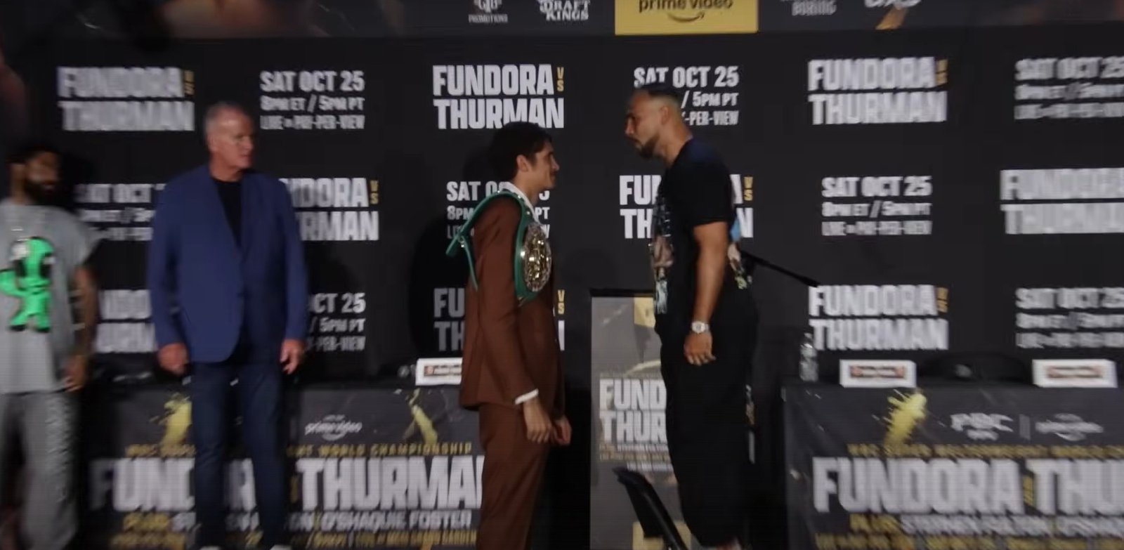 Keith Thurman Stands On A Chair To Even Up Height Difference With Giant Opponent